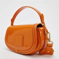 Zest1 orange patent leather mini bag with gold hardware