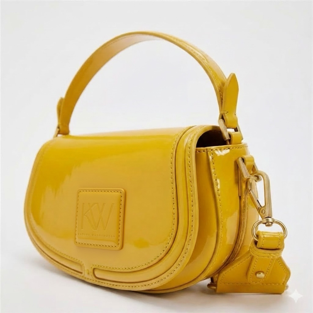 Joy mustard yellow patent leather saddle bag with gold hardware