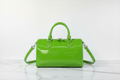 Outside Recovery Bag Apple Green luxury staged photo